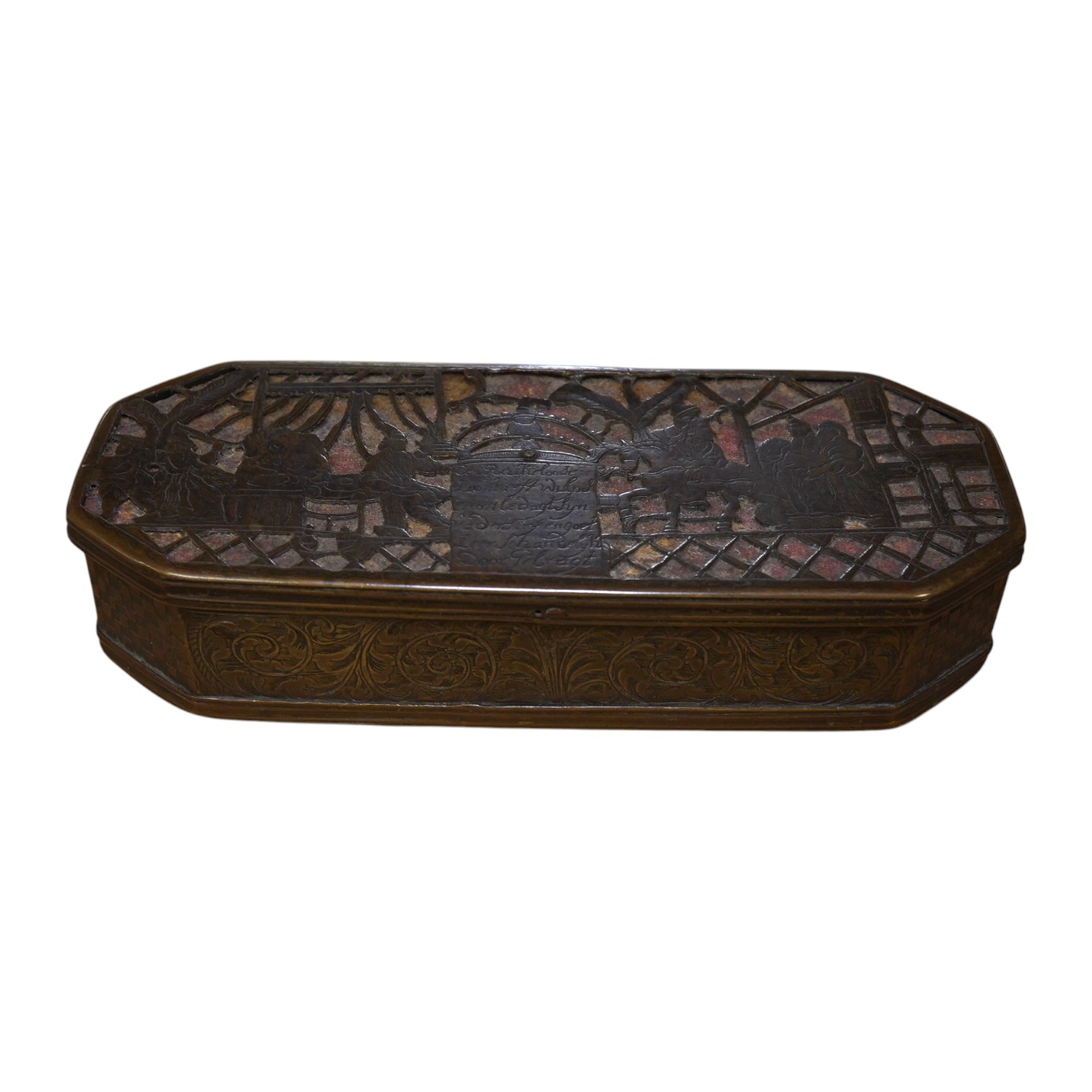 An 18th century Dutch inscribed and reticulated brass tobacco box, 15.5cm in length. Condition - fair